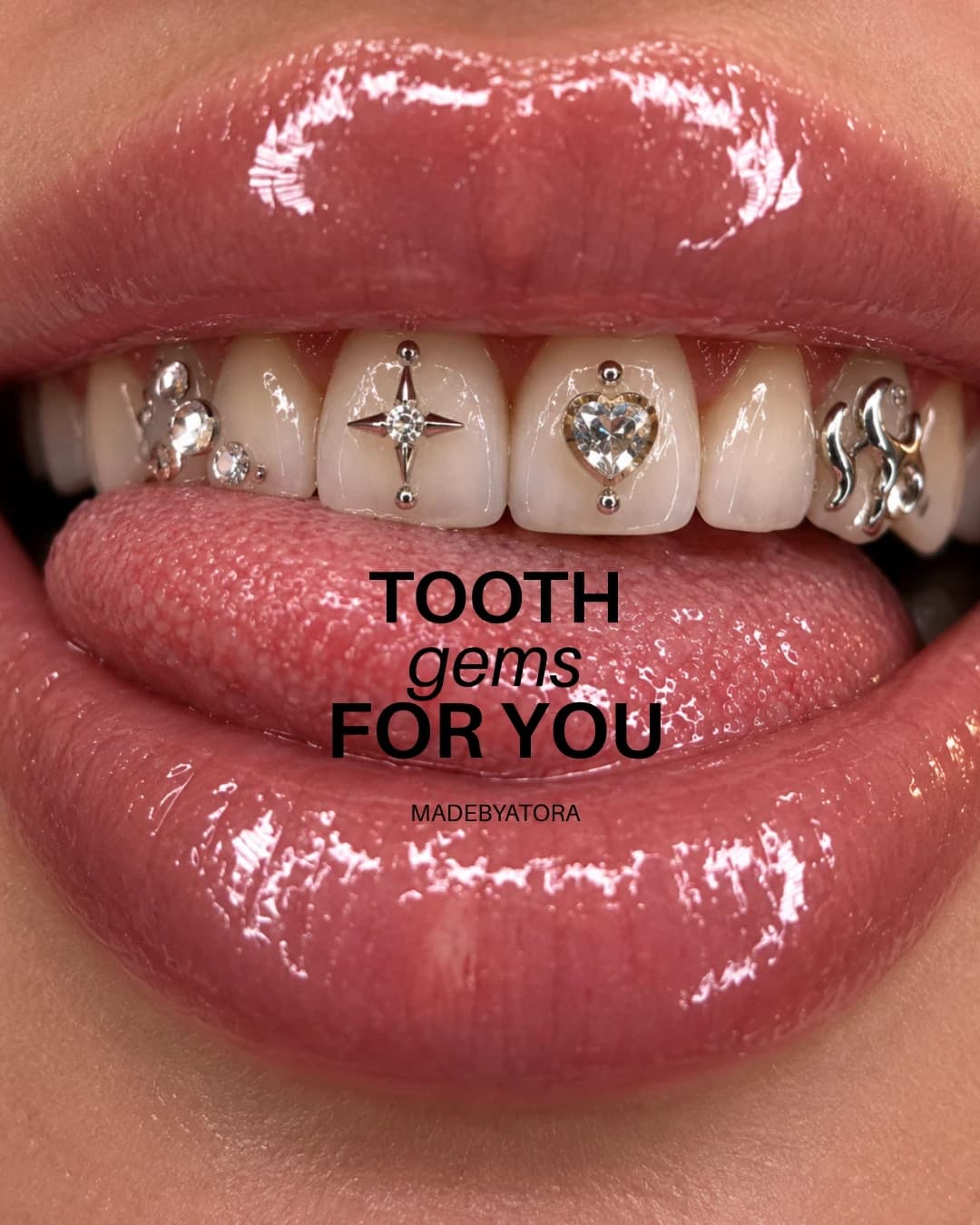 Editorial campaign image by ATORA: a close-up of glossy lips and jewelled tooth gems with the line "Tooth gems for you".